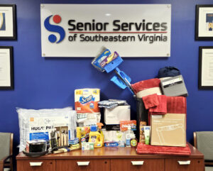 donated house supplies for formerly homeless individuals under senior services logo