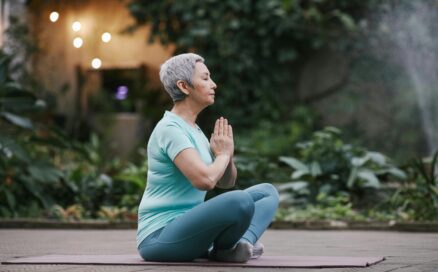 senior female meditating